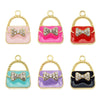 Set of six crystal enamel handbag charm pendants in pink, red, mint green, and purple on gold-toned rings