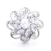 Silver metal snap buttons for jewelry making featuring a floral design with clear stones and a central pearl.