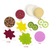 A set of felt food play items including a burger, sandwich, and various shapes like stars and leaves.