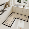 An L-shaped crystal velvet kitchen mat with a non-slip backing placed on a white countertop.