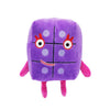 A purple plush doll shaped like the number 1, featuring black dots and pink ears.