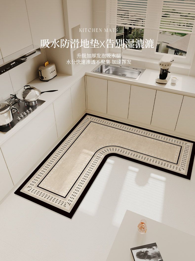 An L-shaped crystal velvet kitchen mat with a black non-slip backing placed on a white kitchen countertop.