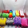 A collection of colorful plush dolls shaped like numbers, including red, green, yellow, and purple.
