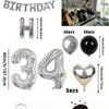 A kit for creating a balloon garland featuring silver and black foil numbers and balloons.