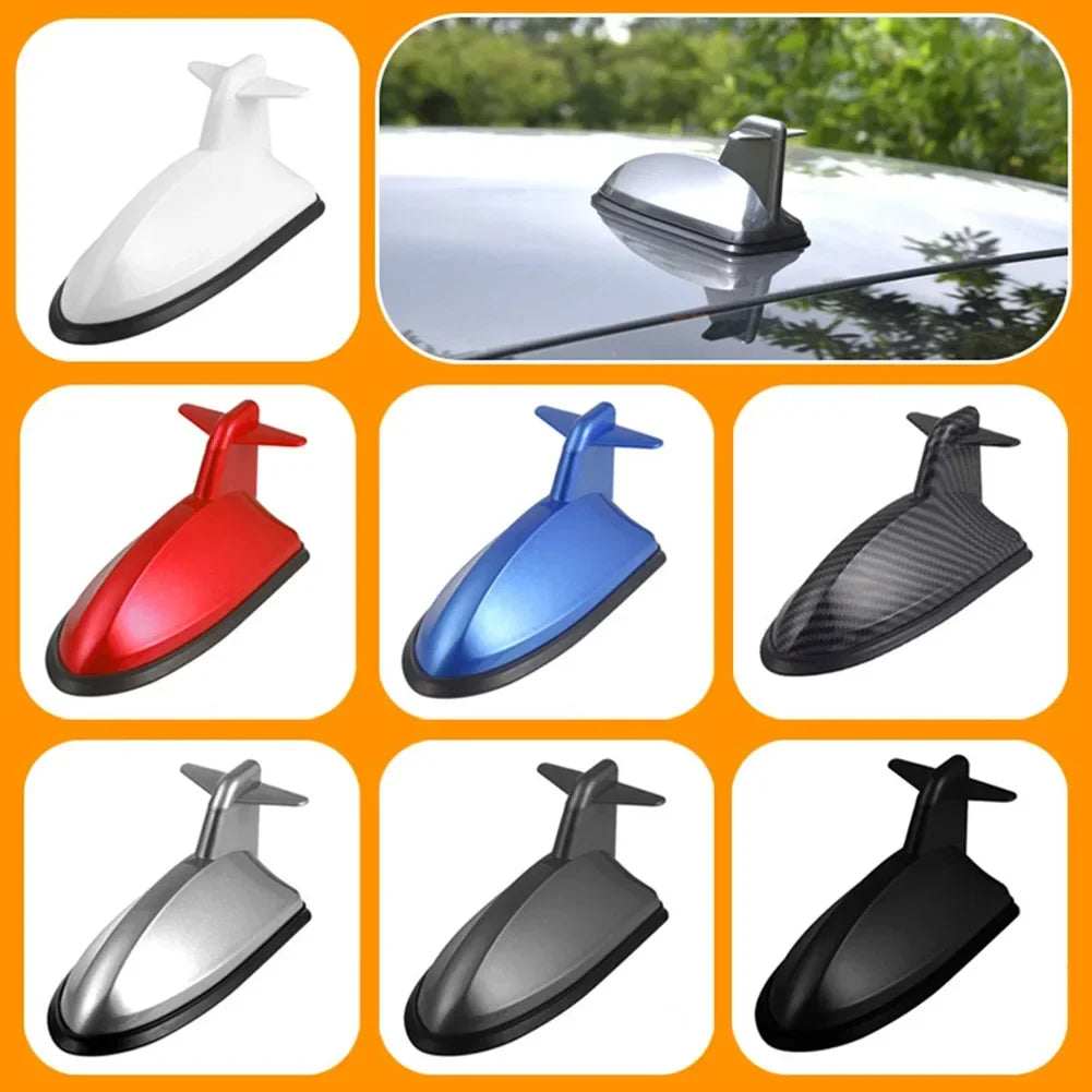 Various styles of Shark Fin car antenna signal boosters in black, red, blue, and silver.