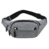 Gray canvas waist pack with black strap and multiple zippered pockets