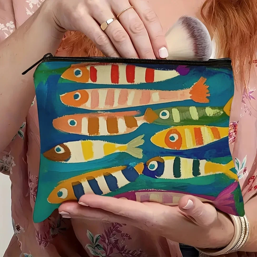 A cosmetic bag featuring a vintage sardine print design on a teal background.