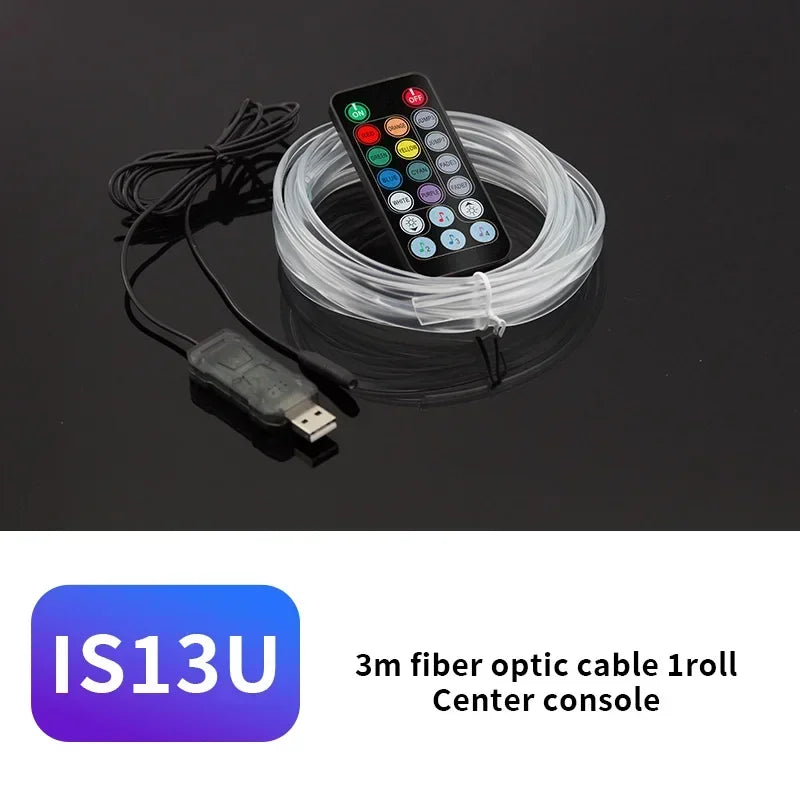 A 3m fiber optic cable roll with a remote control and a black electronic device for a center console.