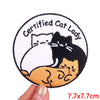 Embroidered patch featuring a black cat sitting on an orange cat inside a circle with the text Certified Cat Lady