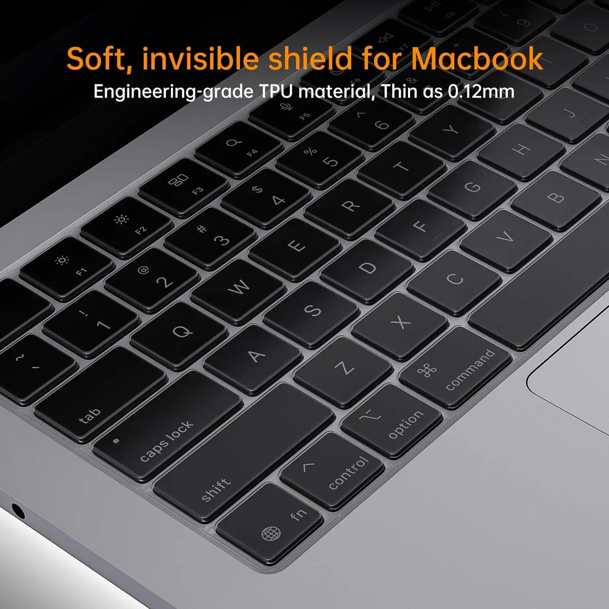 A close-up view of a soft, invisible shield keyboard cover made of engineering-grade TPU material for a MacBook.