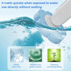 A white disposable toilet brush is shown being used to clean a blue surface, demonstrating its ability to break down dirt and