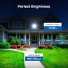 A house exterior showing a solar flood light installation with a motion sensor and dusk-to-dawn operation.