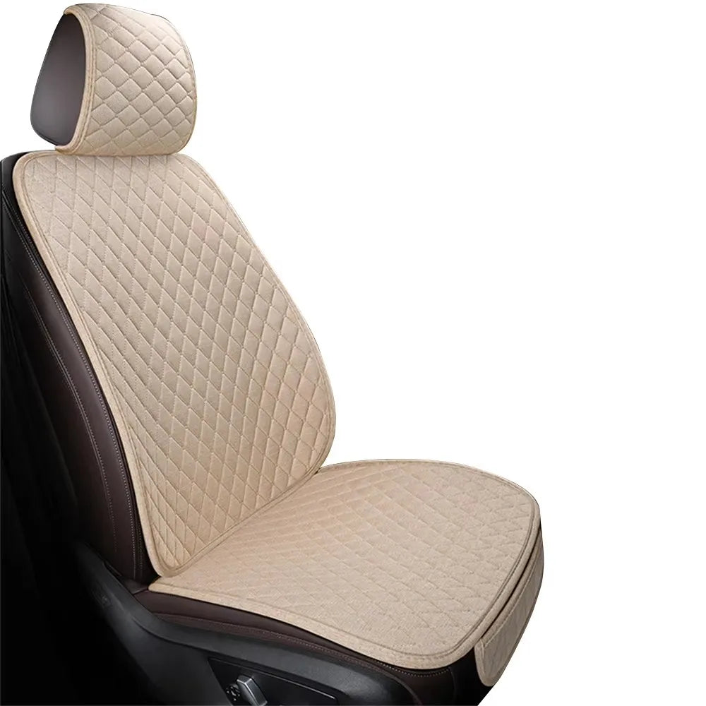 A beige quilted car seat cover set with dark brown upholstery and a matching headrest.