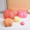 A collection of colorful, soft, foam stepping stones in pink, orange, and yellow for sensory and motor skill development.