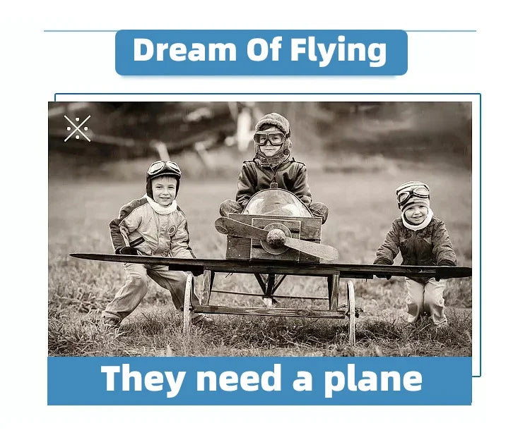 Children are flying a large foam glider plane outdoors in a grassy field.