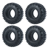 Four black soft rubber tires for 1/18 and 1/24 RC crawler cars shown from the top.