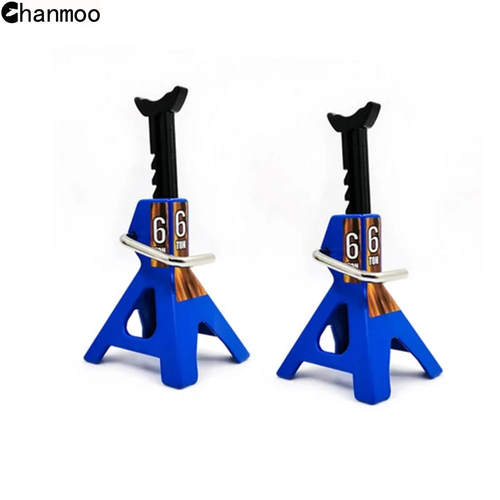 A pair of blue metal jack stands for an RC car, designed to lift and support the vehicle.