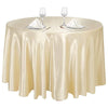 Elegant satin gold round tablecloth set for dining events with glassware and silverware