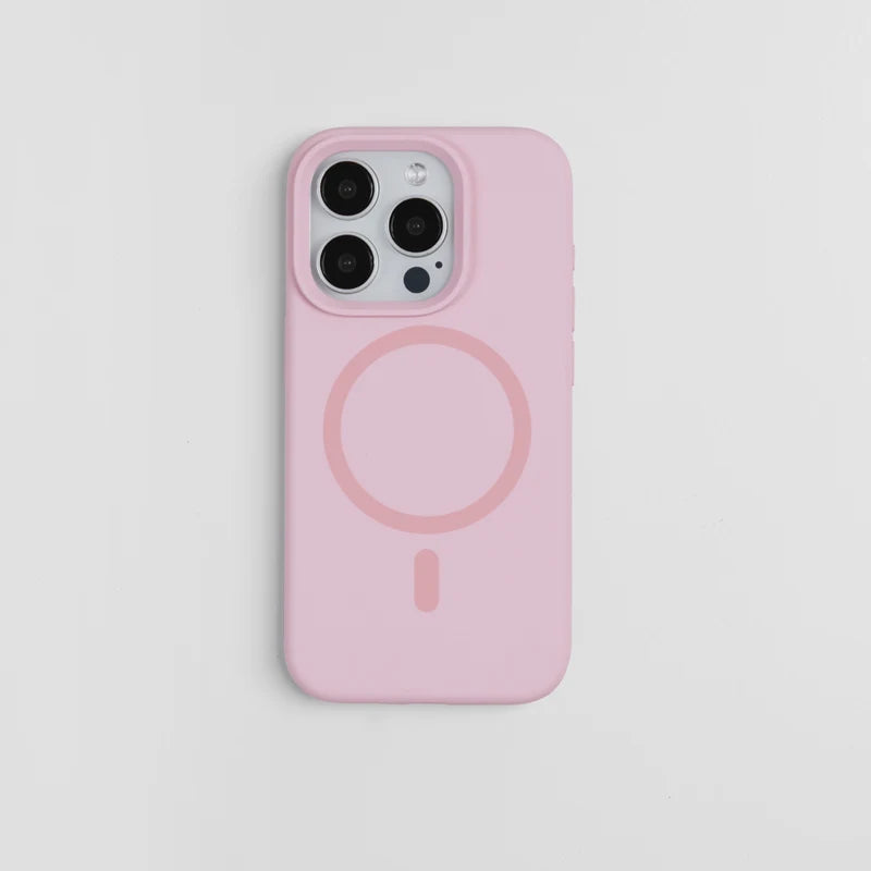Coque de téléphone en silicone rose avec une découpe circulaire à l'arrière.