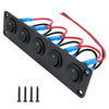 Black panel with multiple circular joystick switches and red, blue, and black wires for an LED toggle switch.