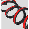 A close-up view of a red and black 3-layer rubber door seal strip for car noise and dust insulation.