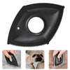 A black pet hair remover and grooming comb with a circular opening, shown in use on a dog.
