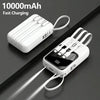 A white 10000mAh portable power bank with built-in cables and a flashlight is shown lying on a dark surface.