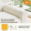 A beige anti-slip sofa cushion is displayed on a white sofa, showing its dimensions and texture.