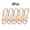 A set of five rose gold metal zipper slider repair kits packaged together.