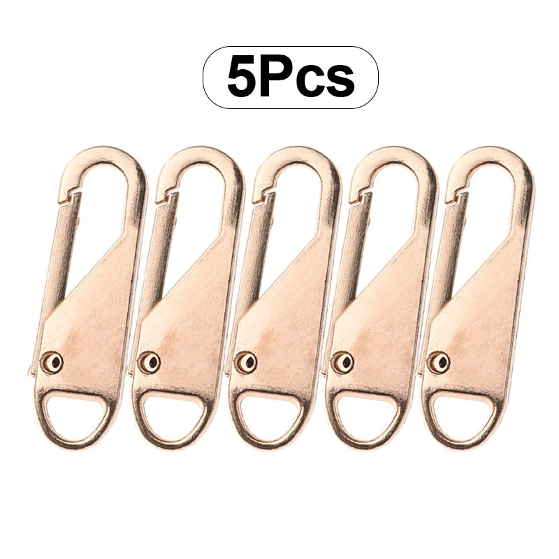 A set of five rose gold metal zipper slider repair kits packaged together.