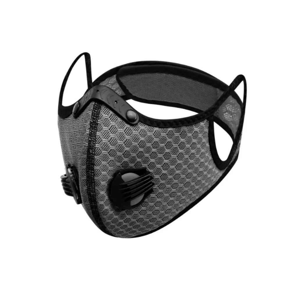 A black reusable dust mask with a mesh face covering and adjustable straps.