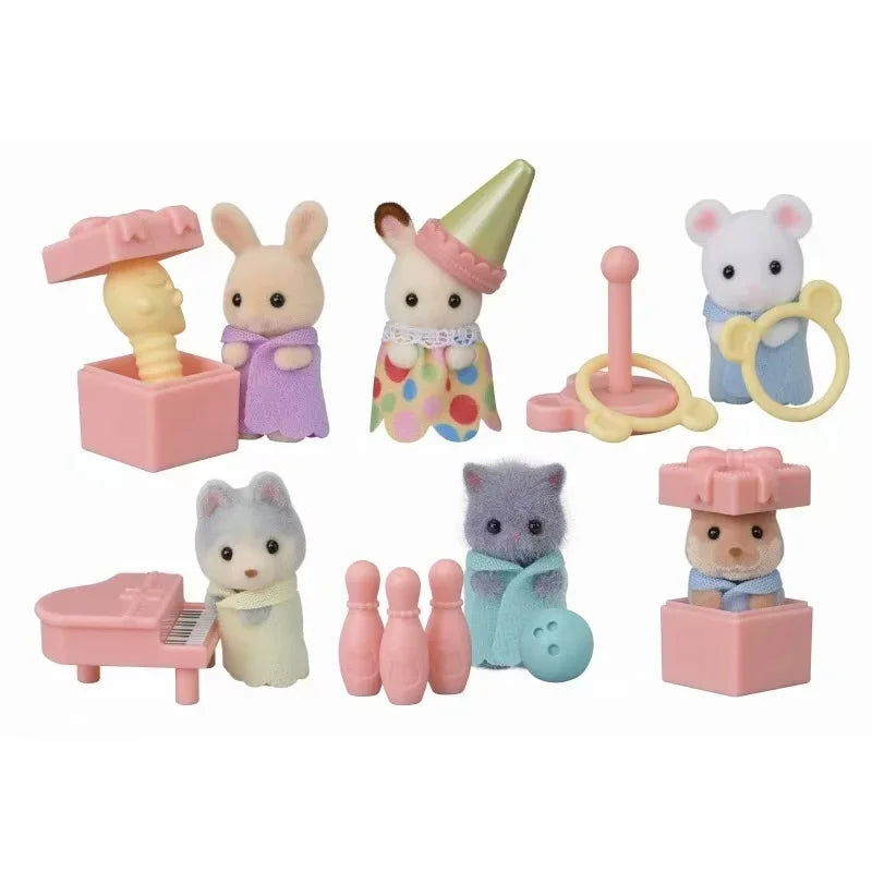 A collection of Sylvanian Families mini baby figures and accessories, including a pink baby, a purple baby with a hat, and va