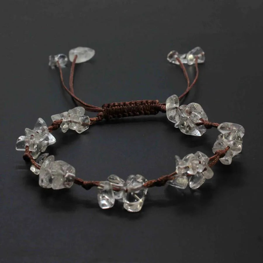 A set of braided crystal chip stone bracelets made with natural amethyst quartz and gemetone weave.