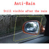 Close-up of a car mirror showing visibility after rain, demonstrating anti-rain film effectiveness.