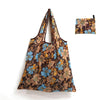 A brown floral patterned reusable shopping tote bag with a matching fabric carry pouch.