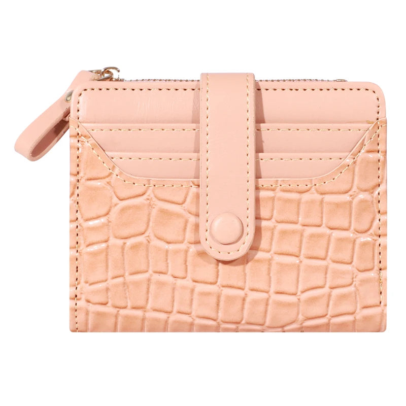 A light pink women's double-zip PU leather wallet with card slots featuring a crocodile texture.