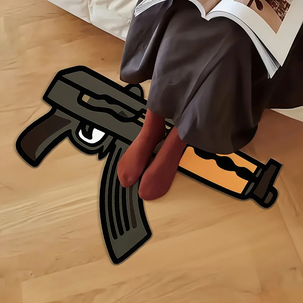 A novelty gun-shaped area rug is shown next to a person's legs and a book on a wooden floor.