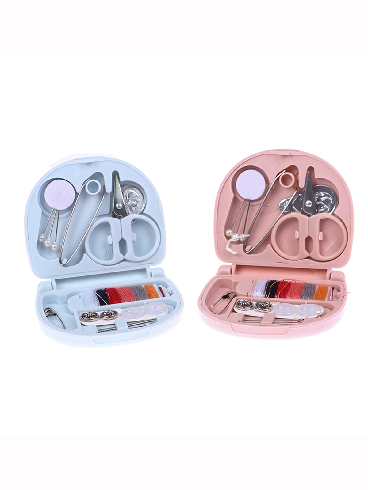 A pink portable mini sewing kit with various needles, scissors, and tools inside the open case.