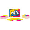 A box of piles of folding clothes poker cards for a family game night