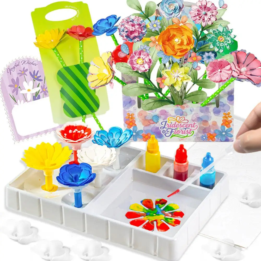 A craft kit featuring paper flowers and colored paper shapes for making a bouquet.