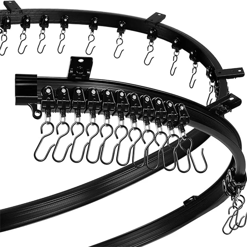 Black flexible bendable curtain track system with multiple hanging hooks and clips.