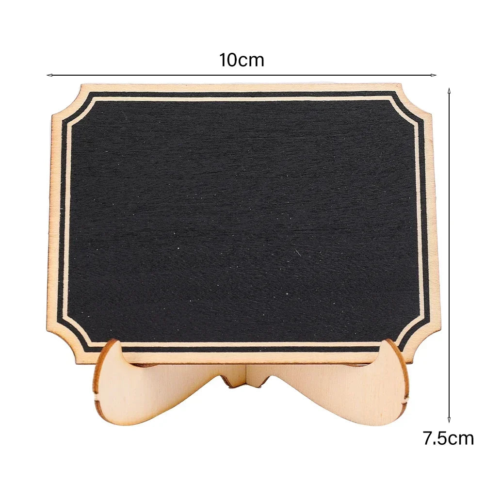 A rectangular wooden chalkboard sign with a black surface and a light wood frame.