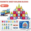 A set of magnetic sheet building blocks in various colors and shapes, including vehicles and structures.