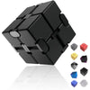A black metal infinity fidget cube with various colored cube pieces displayed on a reflective surface.