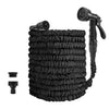 Black expandable garden hose with a nozzle and coiled hose visible.