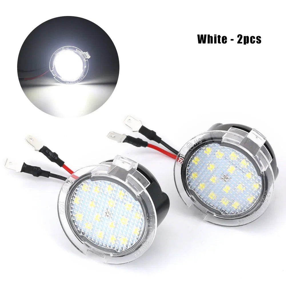 Two white universal LED side mirror puddle lights for vehicles, showing the light beam.
