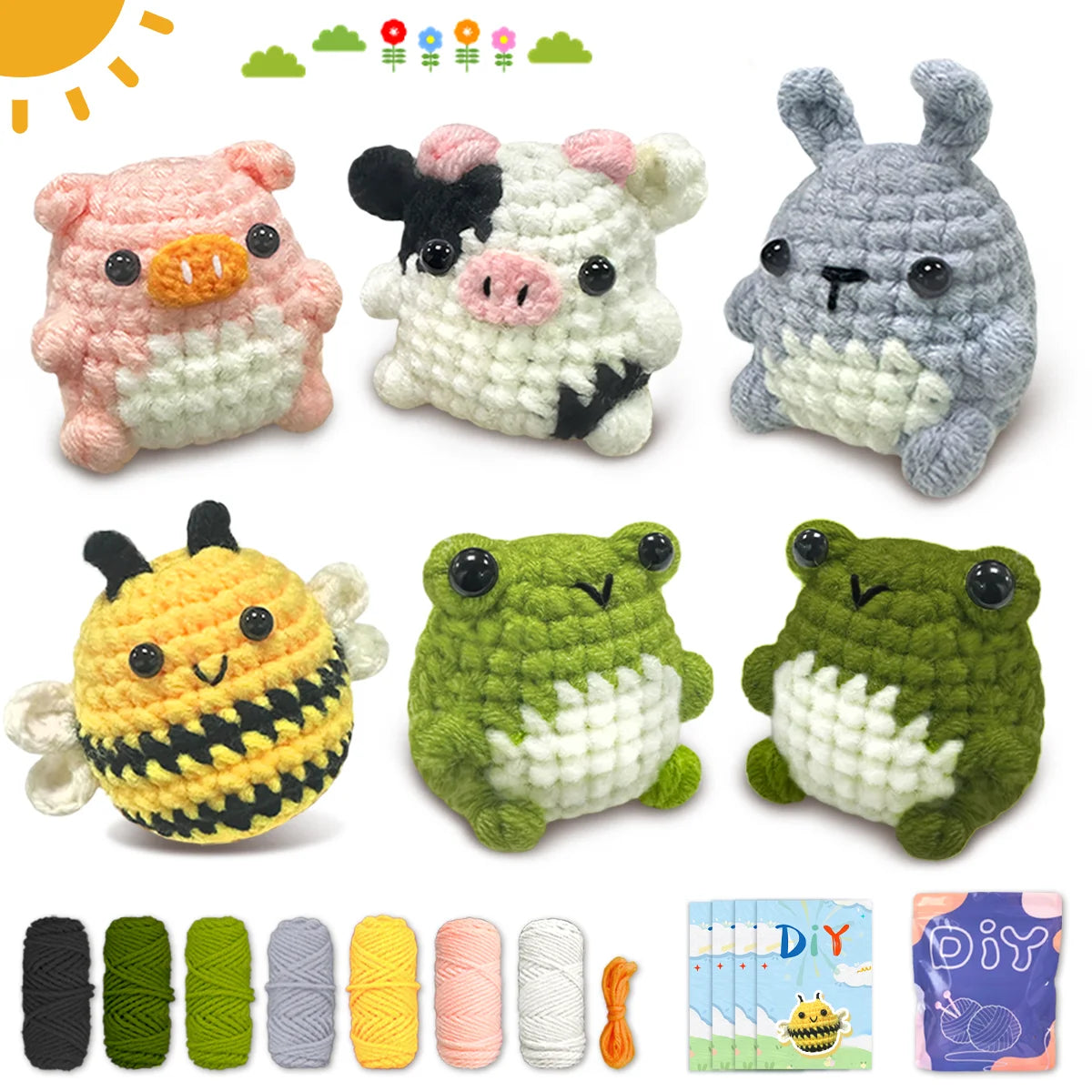 A set of beginner crochet animals including a pig, cow, rabbit, bee, and frogs, along with yarn and needles.