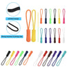 A collection of colorful plastic zipper pulls in various colors and styles, including a black elastic strap and a set of ten 