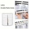 12 pieces of durable white plastic hooks used for hanging shower curtains or fabric.