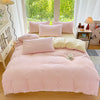 A pink gingham duvet cover set with two pillows is displayed on a bed in a bright, airy room.